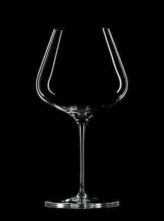 Zalto Burgundy crystal wine glass on black background