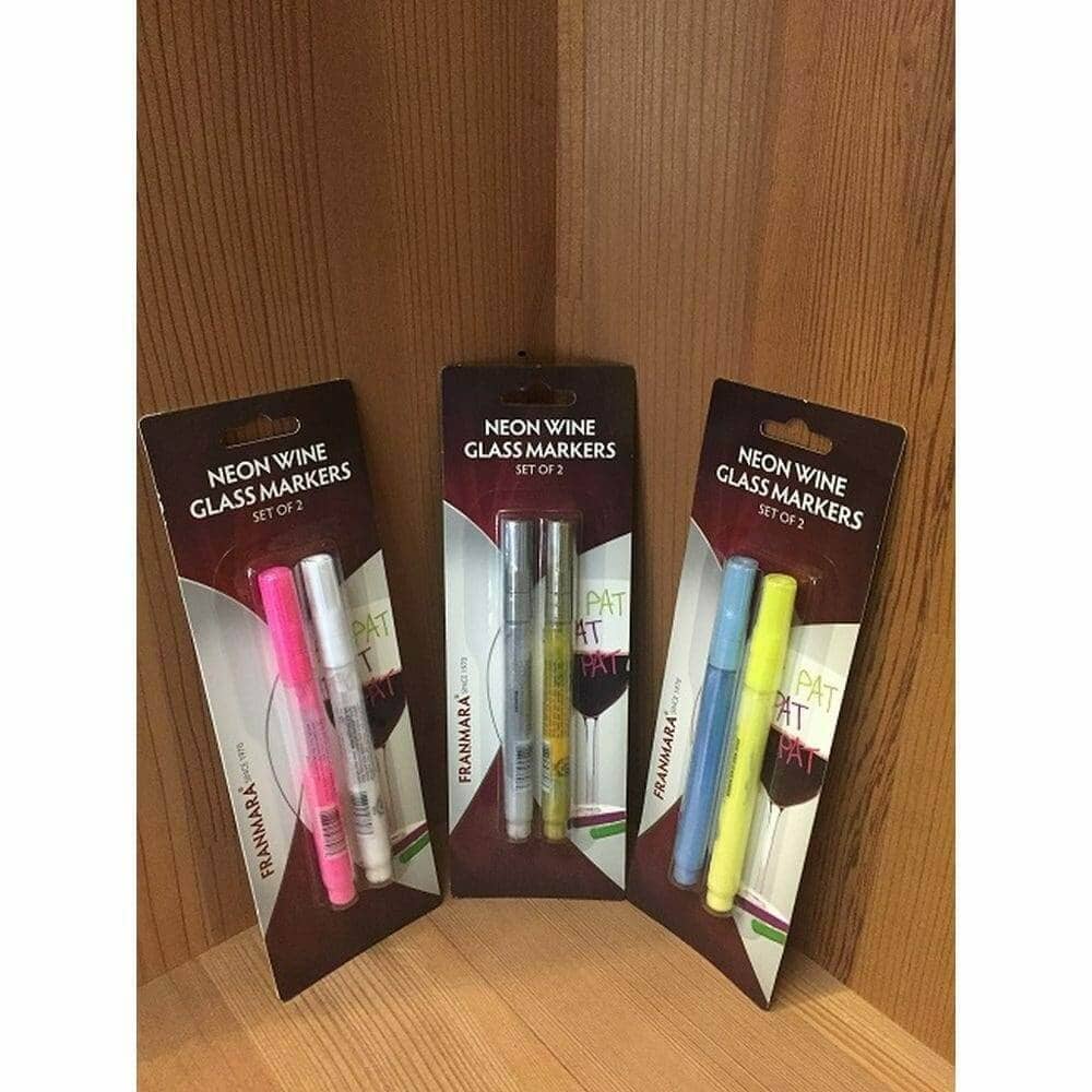 Neon wine glass marker pen packages on a wood shelf corner