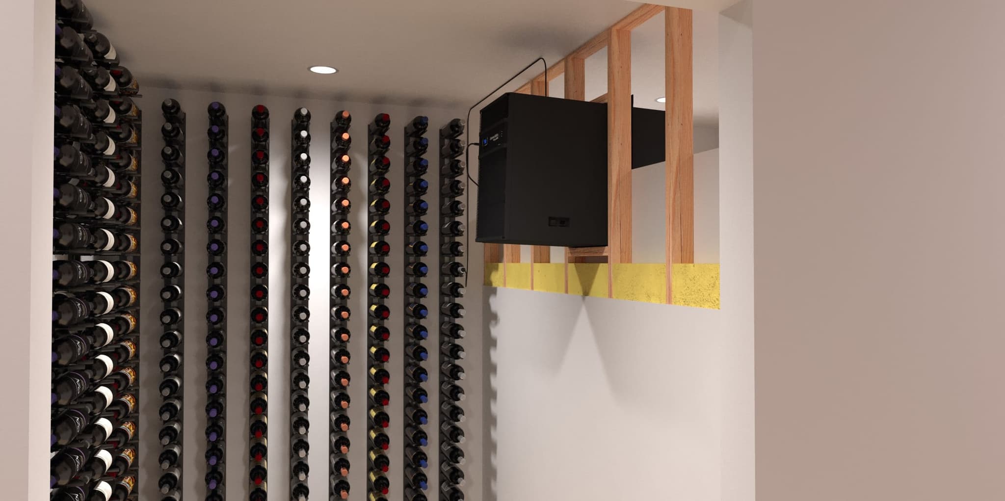 Wine bottles are stored horizontally on wall-mounted racks in a climate-controlled room with unfinished wooden framing and a WhisperKOOL Extreme 8000ti cooling unit.