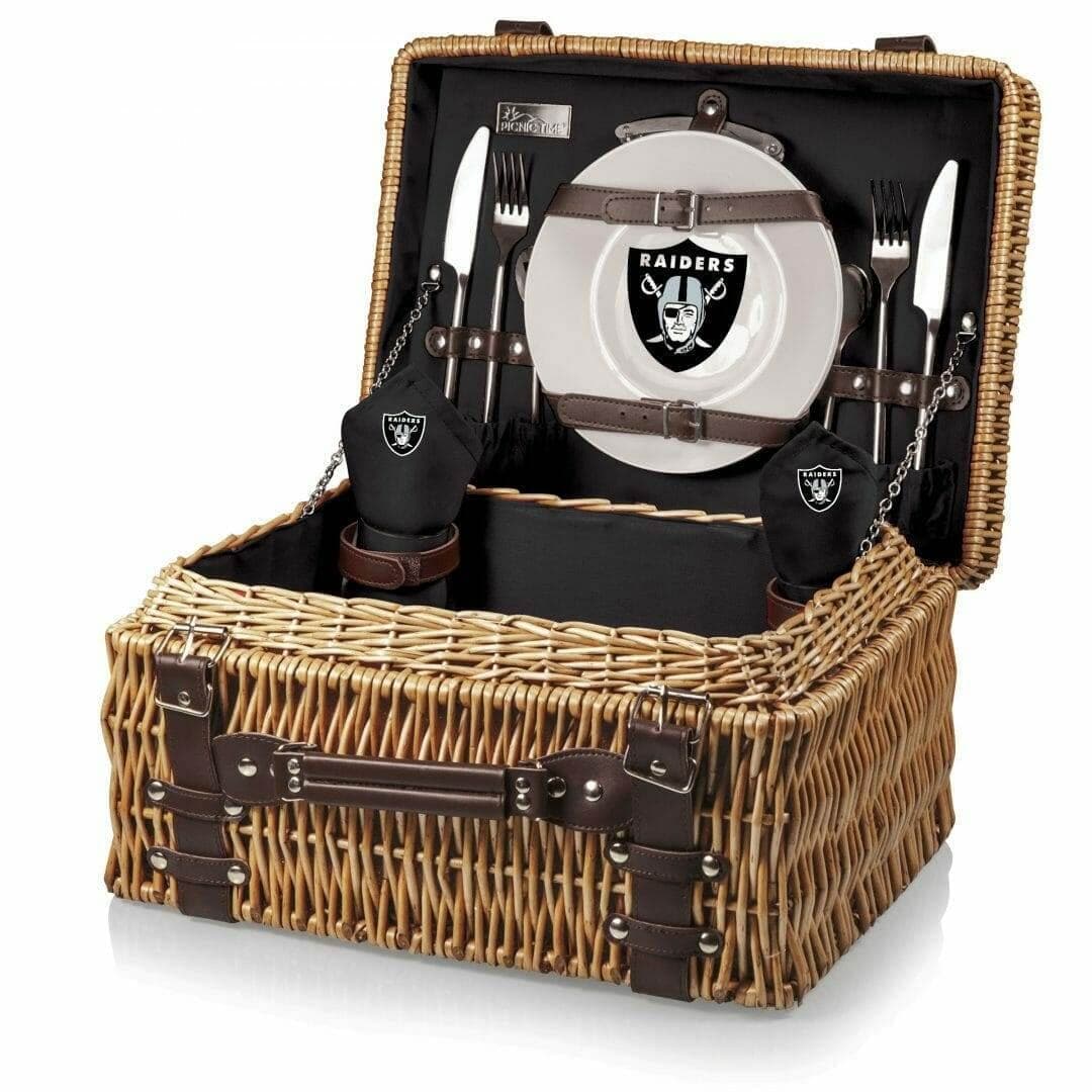 Raiders-branded wicker picnic basket set with plates and utensils