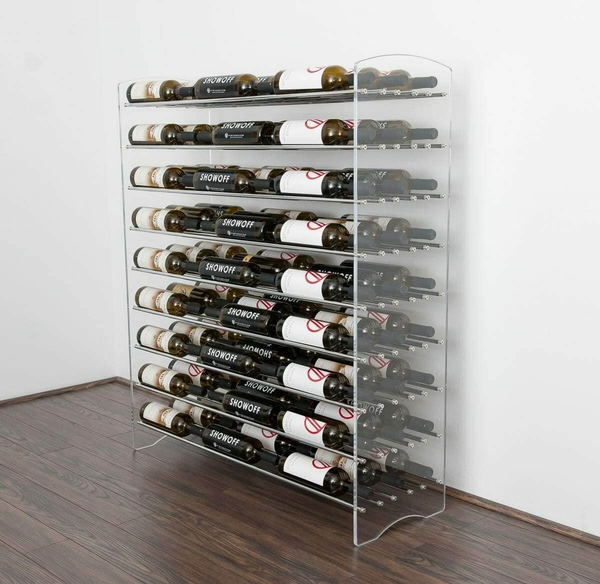 Evolution acrylic and metal wine tower loaded with bottles in a corner