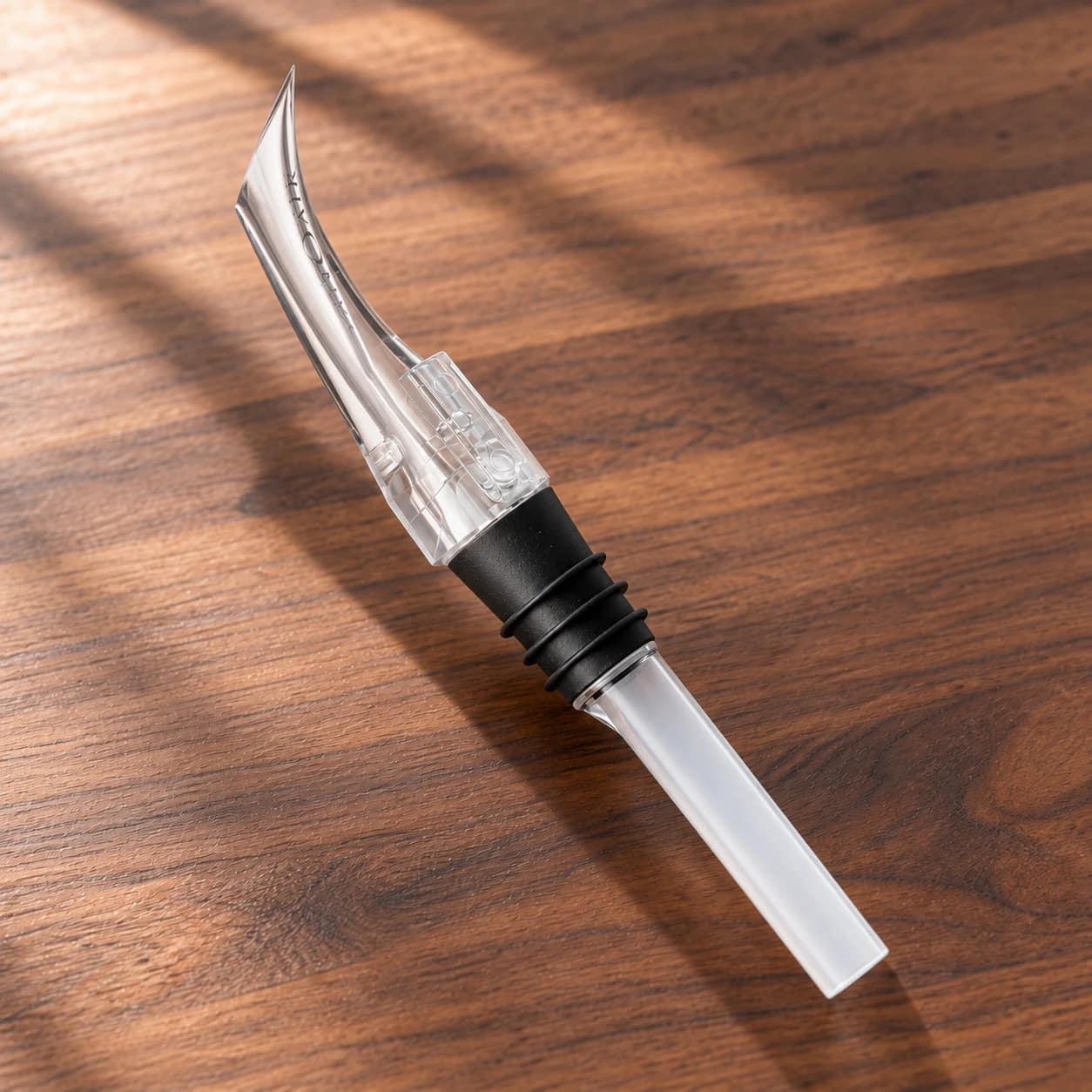 VinOair Wine Aerator on a walnut counter
