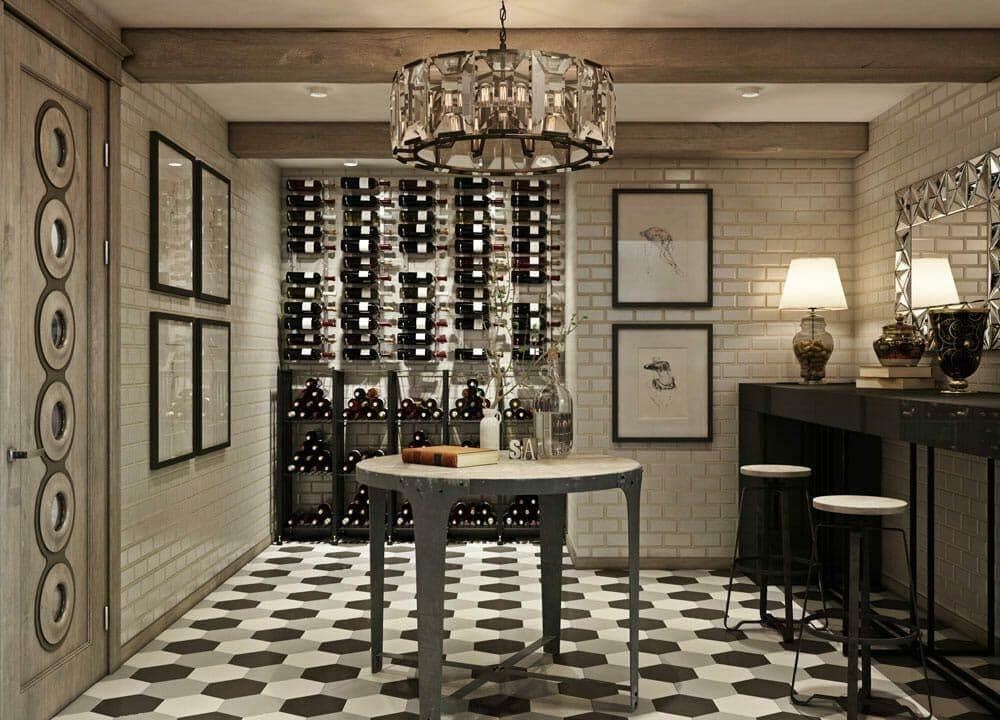 Wine cellar tasting parlor with subway tile walls and framed botanical art