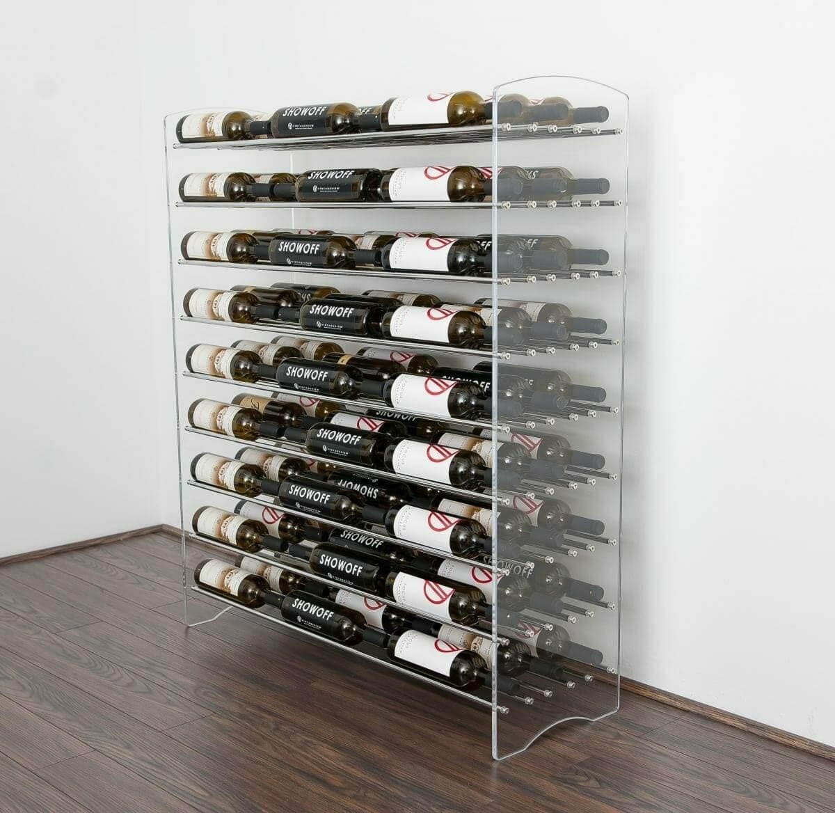 Evolution acrylic and metal wine tower loaded with bottles in a corner