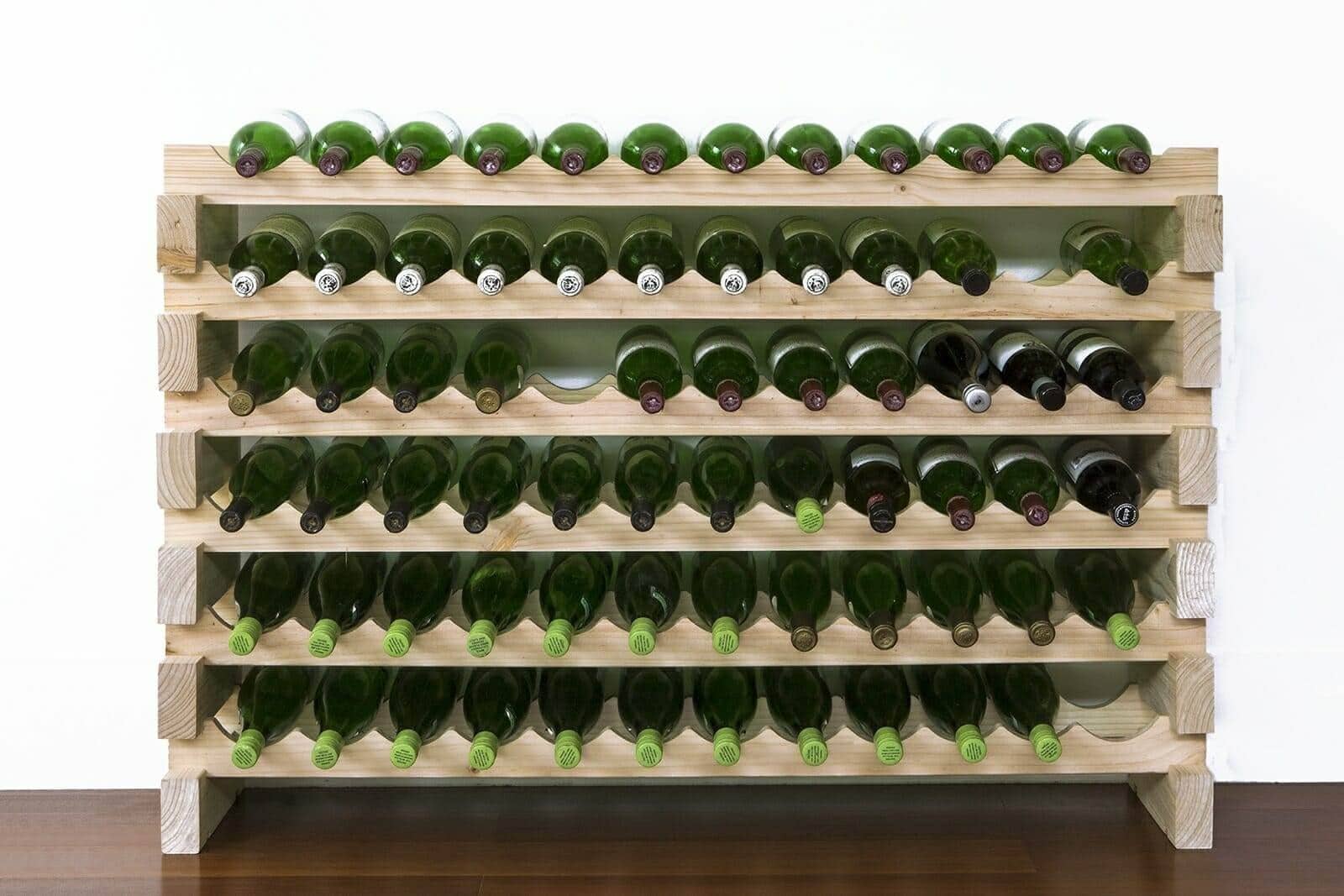 Natural pine 6x12 modular wine rack filled with wine bottles