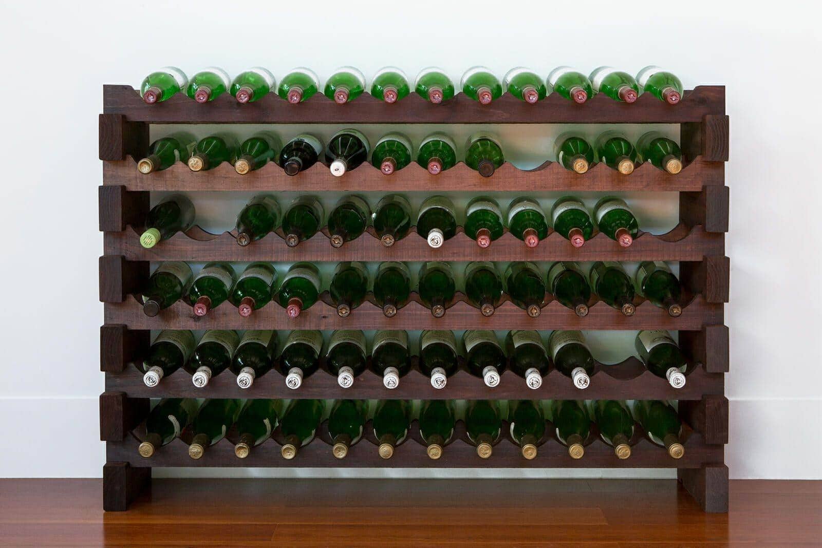Stained 6x12 modular wine rack filled with wine bottles