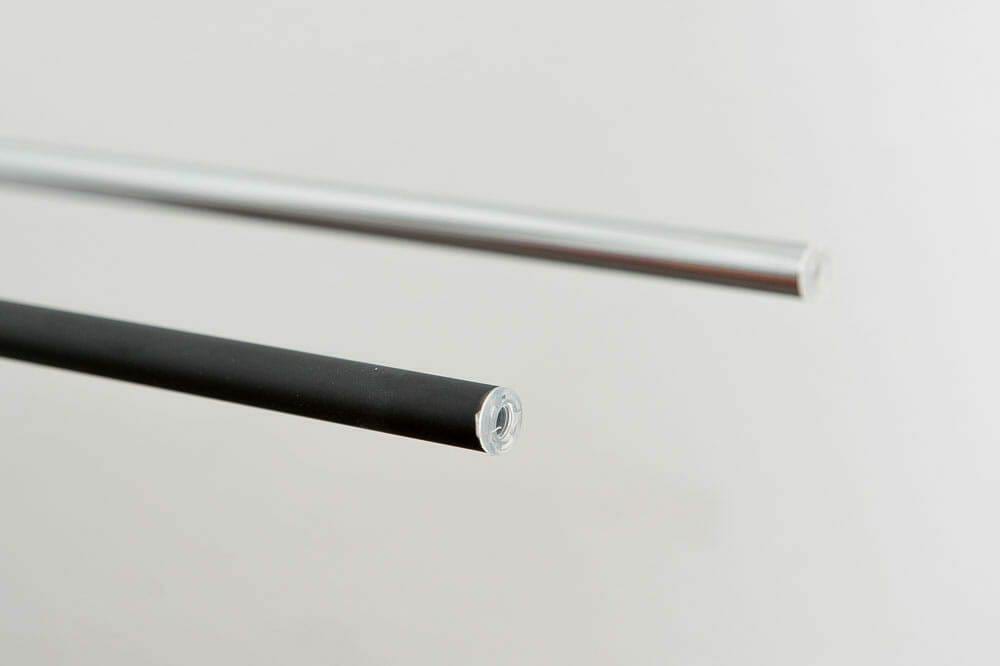 Close-up of chrome and black storage rods on a wine rack