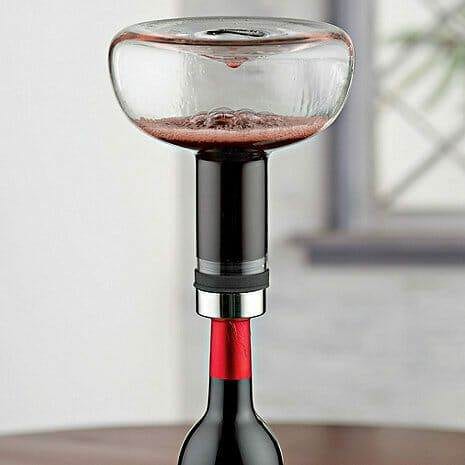 Menu Wine Breather Decanter aerating wine on a table with blurred window light