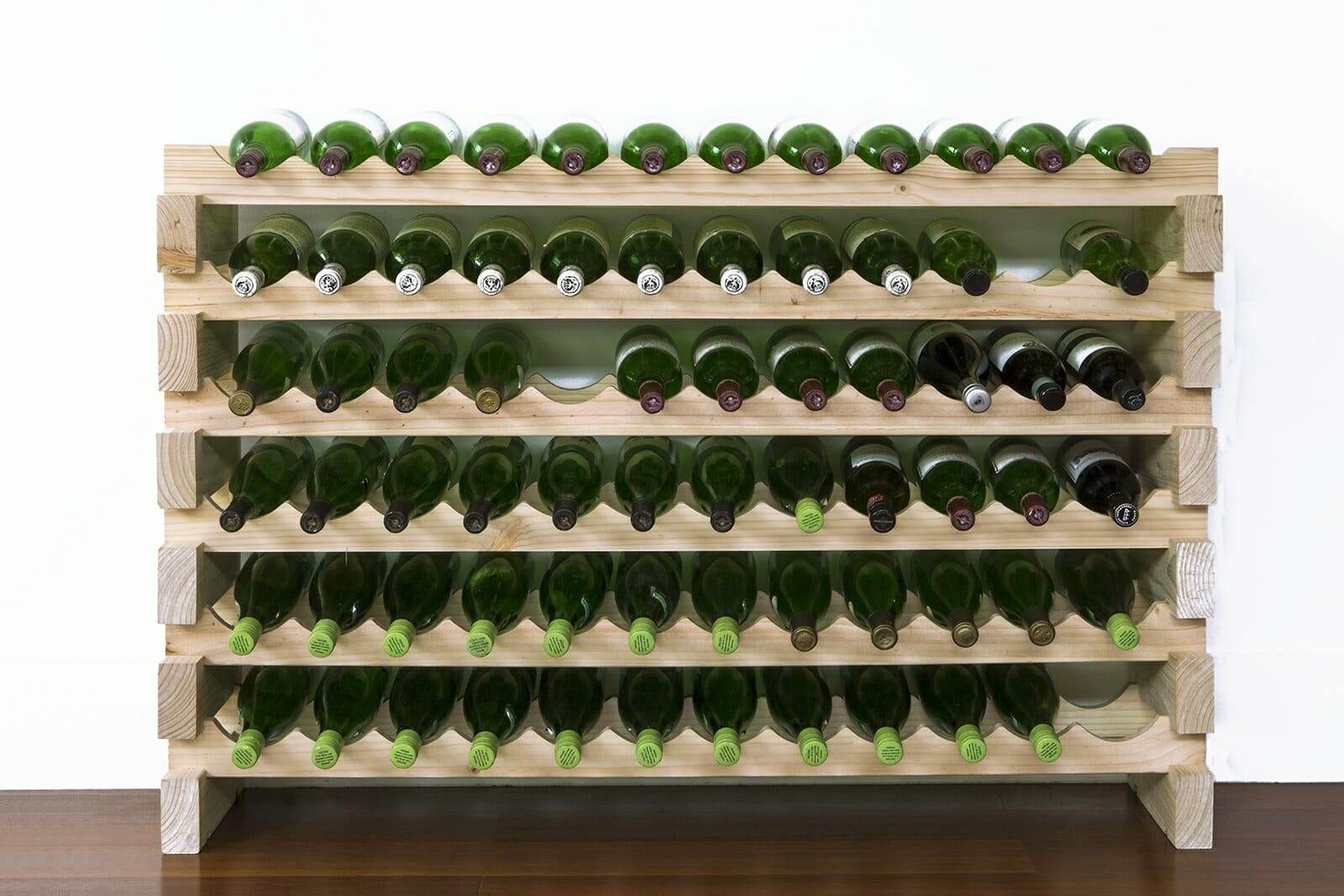 Natural pine 6x12 modular wine rack filled with wine bottles