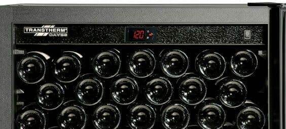 Transtherm digital control panel above racked wine bottles